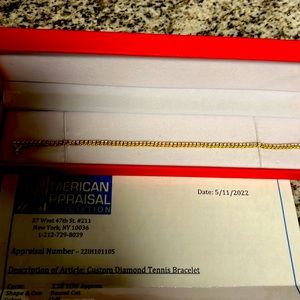 2.20 total carat weight, round cut 14k Yellow Gold Tennis Bracelet 8.5in.